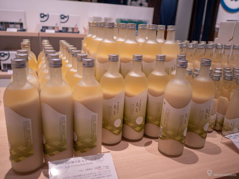 Dozens of sake bottles in the shop.